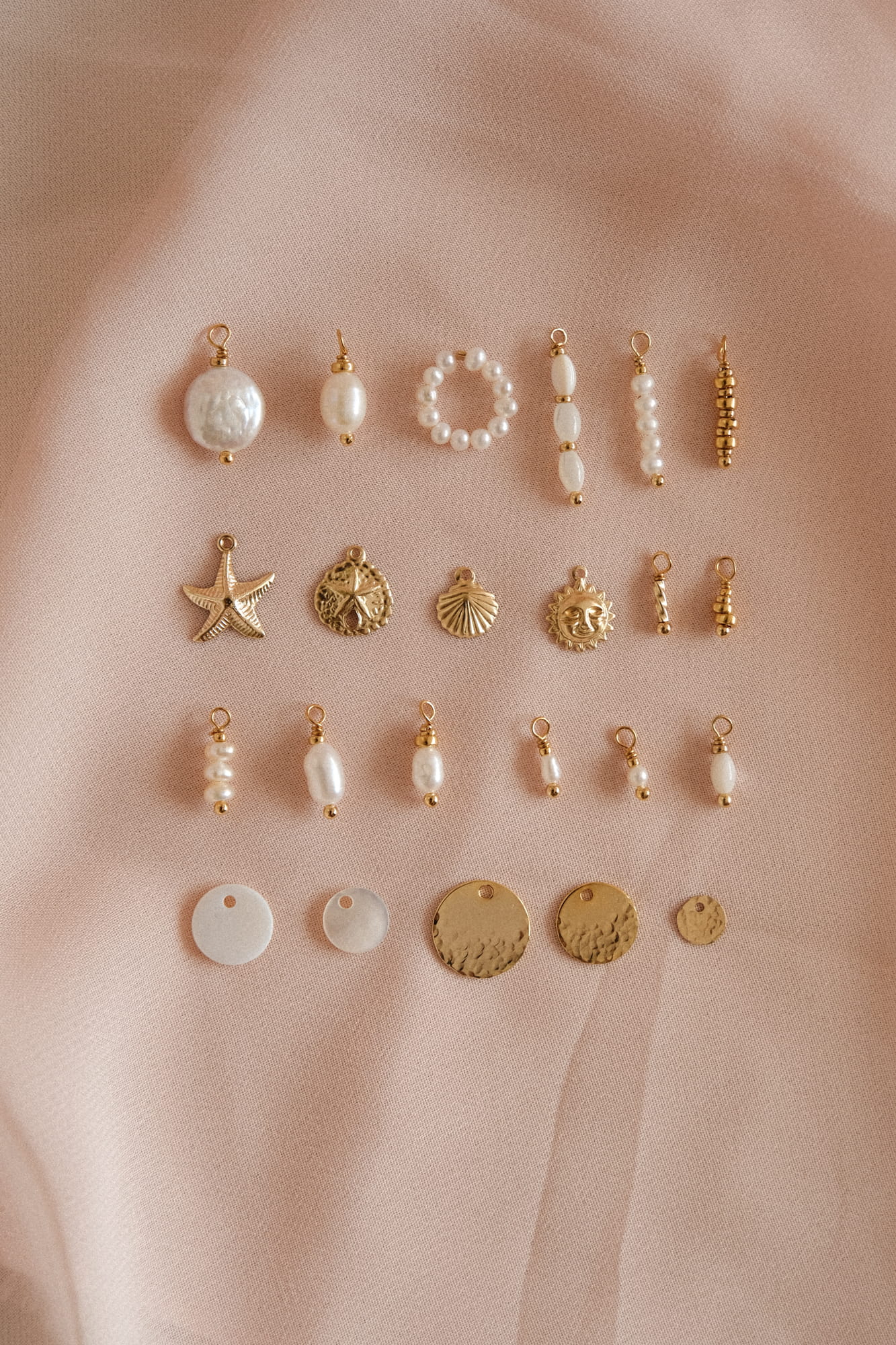 Pendentifs pour colliers, bracelets, ou boucles d'oreilles